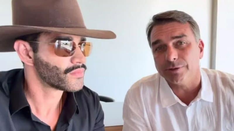 Flávio Bolsonaro se reúne com sertanejos e dança ao som de música antipetista